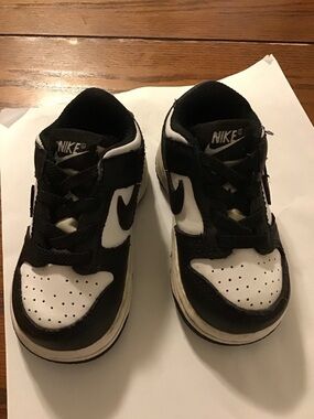 Nike Kids Black and White Low-Top Sneakers with Swoosh
